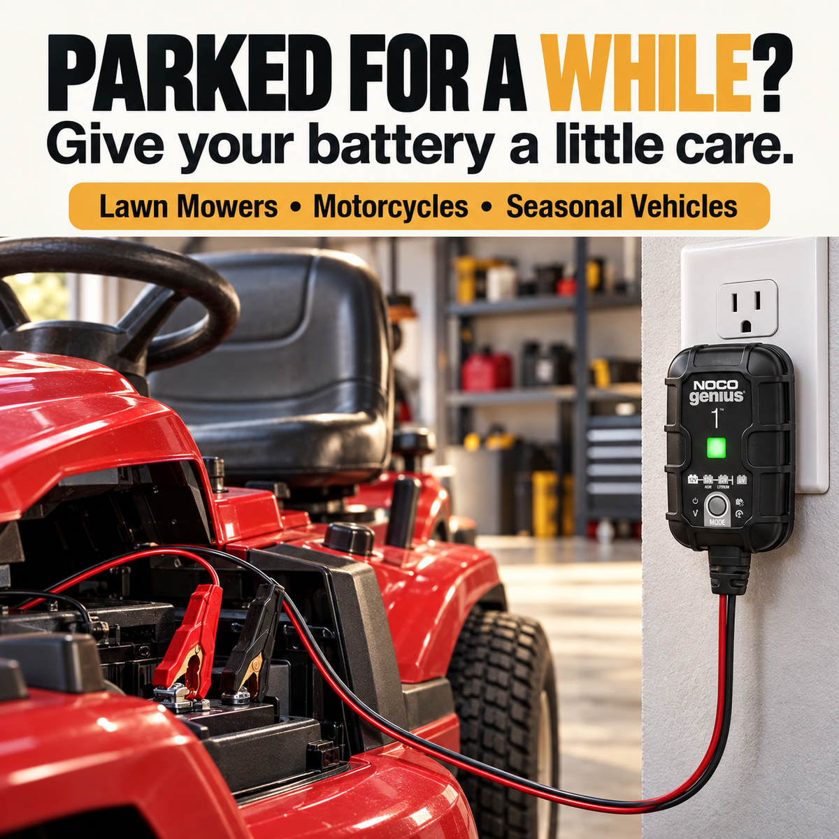 GENIUS1 charging a parked lawn mower in a dry garage